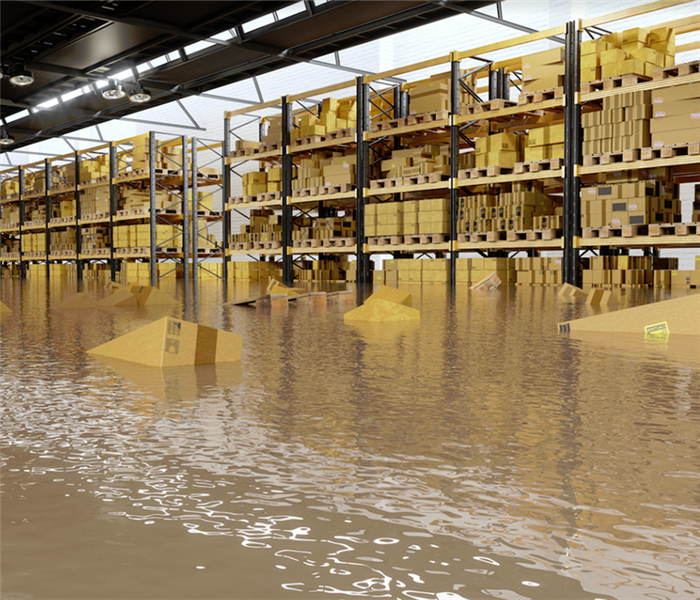 a flooded supply room with water covering the floor